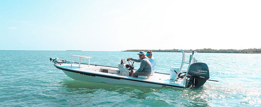 A boat used by Saltwater Fishing Charters is pictured, showcasing the vessel's readiness for a fishing adventure. The image highlights the quality of the charters offered and aligns with the website's focus on providing information about charter rates and services.